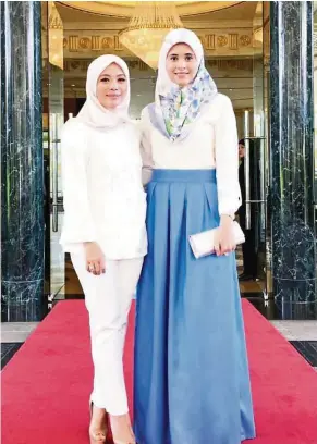  ??  ?? Vivy (left) with HRH Princess Sarah after the launch of The Royal Duck collection in Brunei.