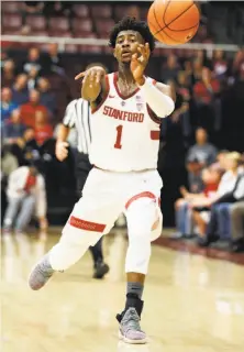  ?? Santiago Mejia / The Chronicle ?? Stanford point guard Daejon Davis Davis had 17 points and five assists before he was hurt with 6:40 left in the game.