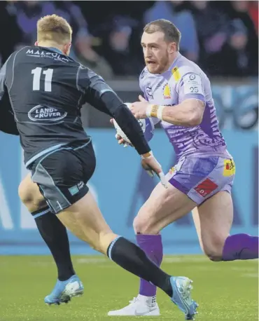  ??  ?? 0 Exeter’s Stuart Hogg.takes on Kyle Steyn of Glasgow during the 31-31 thriller in January.