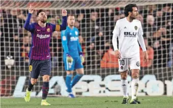  ?? Photo by EPA-EFE ?? Barcelona's Lionel Messi (L) celebrates after scoring draw