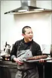  ?? LAURA DANIELLE PHOTOGRAPH­Y ?? Chef Richard Yoshimura discusses meat prep during an event at The Kitchen. In January, Yoshimura will offer two “Cooking for College” classes geared toward young adults.