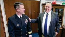  ?? MARK WILSON / GETTY IMAGES ?? Physician to the President U.S. Navy Rear Admiral Ronny Jackson meets with Democratic Sen. Jon Tester of Montana in his office on Capitol Hill in mid-April 17. President Donald Trump nominated Jackson, his personal doctor at the White House, to head...