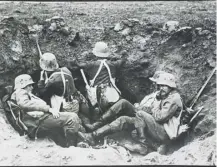  ?? ?? 0 German soldiers man a shell-hole during the Battle of Ypres, which began on this day in 1914