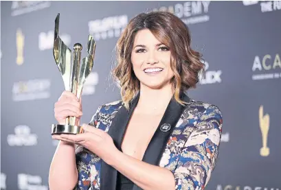  ?? PETER POWER/THE CANADIAN PRESS ?? Elise Bauman won the 2018 Cogeco Audience Choice Award at the Canadian Screen Awards on Sunday.