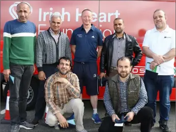  ??  ?? New Ross group Haytham, Aiman, Najati, Faccz, Mohmmad, and Ibrahim Albakkour with Nick Murphy of Sports Active Wexford.