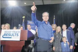  ?? DARRON CUMMINGS/AP ?? Republican Mike Braun celebrates at an election night party Tuesday in Indianapol­is.