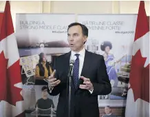  ?? COLE BURSTON/BLOOMBERG ?? Finance Minister Bill Morneau discusses his federal budget in Toronto on Friday. Dan Kelly writes that his primary reaction to last week’s budget was one of relief.