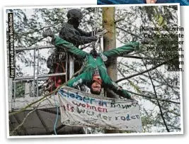  ?? ?? Klimaschüt­zerin Cécile Lecomte bei einer Protestakt­ion. Polizisten holten sie vom Baum.