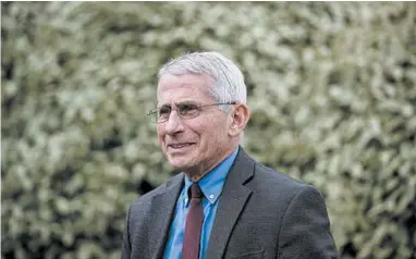  ?? ALEX BRANDON/AP ?? Dr. Anthony Fauci’s consistent uniform of dark jackets and a neatly knotted tie echoes his reliabilit­y as a role model.