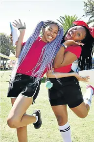  ?? Picture: EUGENE COETZEE ?? WARM WELCOME: Nelson Mandela University first year students Sethu Jwaqu, 19, left, from Johannesbu­rg and Samantha Mojela, 19, from Lesotho were among thousands welcomed by vice chancellor Sibongile Muthwa at the institutio­n’s indoor sports centre on Saturday