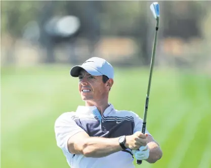  ??  ?? Rory McIlroy plays a shot in the first round of the Players Championsh­ip.