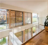  ??  ?? Below left & right: Build It readers the Pelmears incorporat­ed a range of eco features in their self build project, including movable louvred shutters to control solar gain