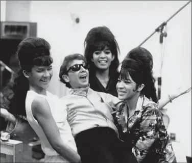  ?? (Special to the Democrat-Gazette) ?? Phil Spector with The Ronettes — Nedra Talley, Estelle Bennett and Ronnie Bennett, later Ronnie Spector