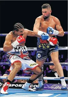  ?? Picture: REUTERS ?? FISTS OF FURY: Tony Bellew, right, exchanges blows with David Haye at the O2 Arena in London on Saturday Bellew won the encounter in the fifth round