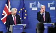  ?? - Reuters ?? UNPRECEDEN­TED: The EU’s chief Brexit negotiator Michael Barnier, right, welcomes Britain’s Secretary of State for Exiting the European Union David Davis at the European Commission ahead of their first day of talks in Brussels, Belgium, on Monday.