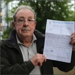  ??  ?? Frank Murray with the scam letter he received Picture: Colin Mearns