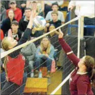  ?? JOHN BREWER - ONEIDA DAILY DISPATCH ?? M-E’s Kim Chandler blocks a kill attempt by DeRuyter’s Amber Stedwell during the Section III Class D championsh­ip.