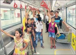  ?? HT PHOTO ?? Twentyfive underprivi­leged kids enjoyed a Metro train ride from Charbagh to Transport Nagar on ▪
Wednesday.