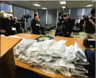  ?? BOB TYMCZYSZYN QMI Agency Niagara ?? The $30 million in drugs are displayed to the media at police headquarte­rs.