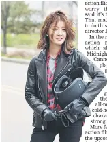  ??  ?? Actress Lee Si-youngr runs, rolls and hangs onto moving cars, not using a body double in MBC action thriller 'The Guardians'.