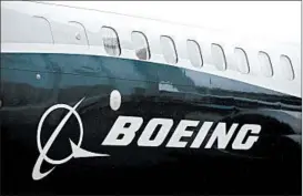  ?? JASON REDMOND/GETTY-AFP 2017 ?? U.S. defense contractor­s, including Boeing, reported a boost in third-quarter revenues.