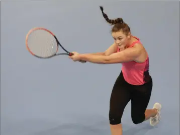  ??  ?? Ellie Murphy playing in the Shankill Tennis Club Indoor Tournament.