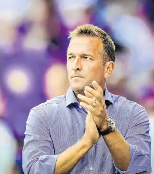  ?? JACOB LANGSTON/STAFF FILE PHOTO ?? Jason Kreis, who was fired by Orlando City in June, his wife and one son still live in the Winter Park home he purchased when he became the Lions’ coach. “We absolutely love it here,” he said of Central Florida.