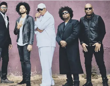  ??  ?? 0 Long to Purple Rain over us: NPG have emerged from Prince’s shadows as all-star musicians in their own right