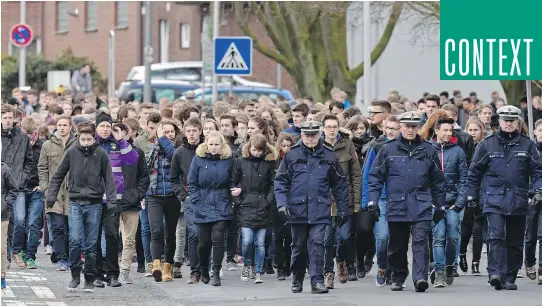  ?? MARTIN MEISSNER/ASSOCIATED PRESS ?? Students of the Joseph-Koenig Gymnasium school arrive for a memorial service for the 16 students and two teachers killed in a plane crash in the Alps on Tuesday. The co-pilot accused of deliberate­ly crashing the plane was obsessed with the Alps and may...