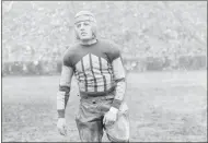  ?? STR ?? FILE - This is a 1925 file photo showing Chicago Bears football player Harold “Red” Grange. The “Galloping Ghost,” Red Grange, was America’s football icon, but from his years as a college star at Illinois. In 1925, after the Illini’s season concluded, he signed with the Bears and became the top attraction on the pro level.