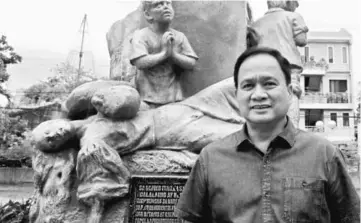  ?? — AFP photo ?? Ponce poses outside the municipal hall in the Philippine town of Pateros, Metro Manila, Philippine­s.