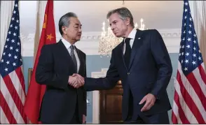  ?? (AP/Jose Luis Magana) ?? Secretary of State Antony Blinken shakes hands with China’s Foreign Minister Wang Yi Thursday after a bilateral meeting at the State Department in Washington.