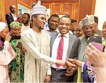  ??  ?? President Buhari’s son, Yusuf(left); Medical Director, Cedarcrest Hospitals, Dr Felix Ogedegbe, and Kogi State Governor, Yahaya Bello in Abuja on Yusuf’s return to the country on Wednesday. Yusuf had been successful­ly treated in Cedarcrest Hospitals...