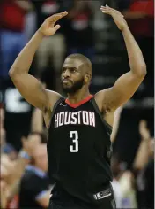  ?? ASSOCIATED PRESS ?? HOUSTON ROCKETS GUARD Chris Paul reacts after a 3-pointer by PJ Tucker during the second half in Game 5 a second-round playoff series against the Utah Jazz on Tuesday in Houston.