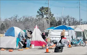  ?? Molly Hennessy-Fiske Los Angeles Times ?? A HOMELESS camp on the outskirts of Austin, Texas. Gov. Greg Abbott fumed on Twitter: “No SF in TX.”