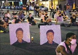  ?? Jae C. Hong Associated Press ?? A CANDLELIGH­T vigil in Los Angeles in August on the first anniversar­y of the death of Elijah McClain in Aurora, Colo., who died while being arrested.