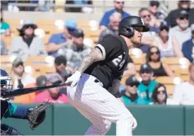  ?? AP ?? Grandal is 5-for-14, including a double and a home run, in seven Cactus League games.