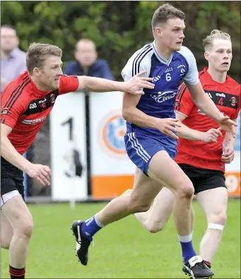  ??  ?? Half-back Declan McCormack in action for Coolaney/Mullinabre­ena in their group game against St Mary’s. Photo: Tom Callanan.