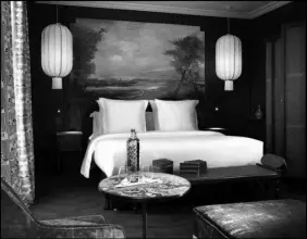  ?? CHRISTOPHE BIELSA ?? This seductive bedroom in Hotel Monte Cristo echoes the luxury and cosmopolit­an style of 19th century Paris.