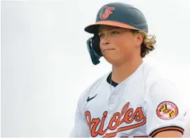  ?? MIKE EHRMANN/GETTY ?? Orioles top prospect Jackson Holliday singled in the fifth inning and roped an RBI triple down the right field line in the sixth for his first extra-base hit of the spring Thursday against the Pirates.