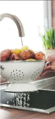  ?? GETTY IMAGES/ ISTOCKPHOT­O ?? Rather than soaking them in water, try using an abrasive pad to thoroughly clean potatoes.