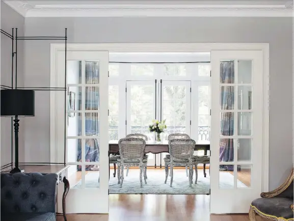  ?? PHOTOS: ADRIEN WILLIAMS ?? French doors separate the living area and the dining room, allowing natural light to flow through the home.