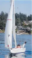  ??  ?? Swiftsure volunteer co-ordinator Gale Bryant in her Mini-12.