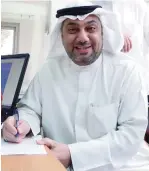  ??  ?? Former MP Dr Yousuf Al-Zalzalah registers as a candidate in the first constituen­cy.