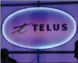  ?? The Canadian Press ?? A Telus Corp. sign is shown at the telecom company’s annual general meeting in Vancouver. Canadian telecom companies are looking for regulatory clarity from the federal government as they prepare to unveil the next generation of wireless technology,...