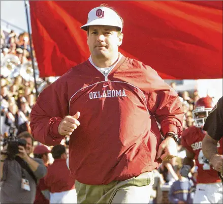  ?? BRIAN BAHR / GETTY IMAGES ?? Bob Stoops led Oklahoma to 10 Big 12 titles and one national championsh­ip in his 18 seasons in Norman. “He leaves Oklahoma with a long track record of success and will be remembered as a Sooner legend. I wish him the best,” former UT coach Mack Brown...