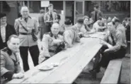  ?? NEW YORK CITY MUNICIPAL ARCHIVES VIA AP ?? In this May 22, 1938 photo, provided by the New York City Municipal Archives, members of the German American Bund pose for a photo at Camp Siegfried in Yaphank, N.Y. The enclave of former summer bungalows is being forced to end policies that limited...