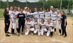  ?? KYLE FRANKO — TRENTONIAN PHOTO ?? Burlington Township players and coaches pose with the championsh­ip plaque after defeating Delsea during the South Jersey Group III softball sectional final on Thursday afternoon in Burlington.