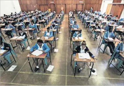  ?? Photo: Shelley Christians/The Times/ Gallo Images ?? Undermined: The basic education department wants successful bidders to prepare questions for tests and exams, taking over a core responsibi­lity of teachers.