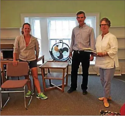  ??  ?? Christine Suplick, Chris Strawbridg­e, and Meredith Swift work to get the classrooms ready for the Sunday School program to begin at Haverford Friends Meeting. Classes begin Sept. 17 at 10:30 a.m. at the meeting house, 855 Buck Lane, Haverford. There is...